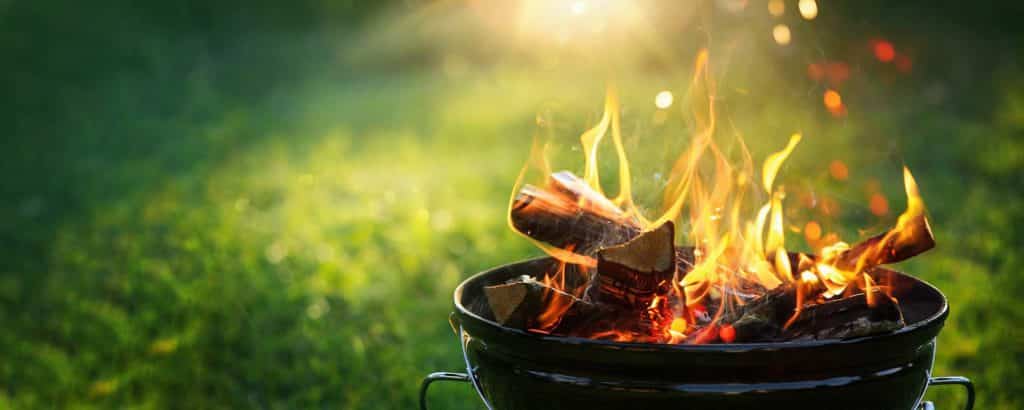 Barbecue Grill with Fire on an open-air flame.